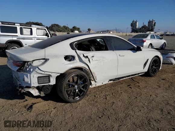 ✅ 2022 BMW 8 Series 840i • VIN: WBAGV2C0XNCG81832 • Lot: 74798684. Listed on Copart with 27,972 mi. Free auction sales archive from the USA and detailed vehicle history report at DreamBid. Image 3.