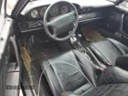 ✅ 1991 Porsche 911 • VIN: WP0AB2964MS411168 • Lot: 75928974. Wystawiony na Copart z przebiegiem 141 731 mil. Bezpłatny archiwum sprzedaży aukcyjnych z USA i szczegółowy raport historii pojazdu na DreamBid. Zdjęcie 8.