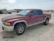 2003 Dodge Dakota SLT z VIN 1D7HL48X73S114322, wystawiony jako Copart lot #69361515 z przebiegiem 224 225 mil mil oraz Szkoda całkowita • Salvage title. Historia ofert i sprzedaży dostępna na DreamBid. Obrazek 1.