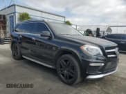 ✅ 2015 Mercedes-Benz GL 63 AMG • VIN: 4JGDF7EE9FA445980 • Lot: 82615665. Listed on Copart with 128,834 mi. Free auction sales archive from the USA and detailed vehicle history report at DreamBid. Image 4.