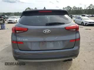 2019 Hyundai Tucson SEL z VIN KM8J33AL7KU956220, wystawiony jako Copart lot #70265675 z przebiegiem 168 653 mil mil oraz Szkoda całkowita • Salvage title. Historia ofert i sprzedaży dostępna na DreamBid. Obrazek 6.