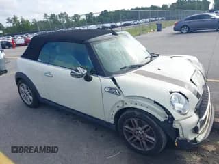 ✅ 2014 MINI Convertible S • VIN: WMWZP3C52ET706689 • Lot: 42813835. Listed on IAAI with 91,081 mi. Free auction sales archive from the USA and detailed vehicle history report at DreamBid. Image 1.