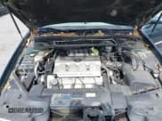 ✅ 1998 Cadillac Eldorado Touring • VIN: 1G6ET1299WU613236 • Lot: 43173727. Listed on IAAI with 165,556 mi. Free auction sales archive from the USA and detailed vehicle history report at DreamBid. Image 10.