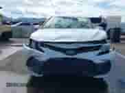 2021 Toyota Camry Hybrid LE with VIN 4T1C31AK8MU030335, listed as a IAAI auction lot 43438433 with 79,774 mi miles and . Bid and sale history available at DreamBid. Image 6.