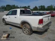 ✅ 2015 Ram 1500 Laramie • VIN: 1C6RR6NM0FS608228 • Lot: 60837375. Listed on Copart with 209,960 mi. Free auction sales archive from the USA and detailed vehicle history report at DreamBid. Image 2.