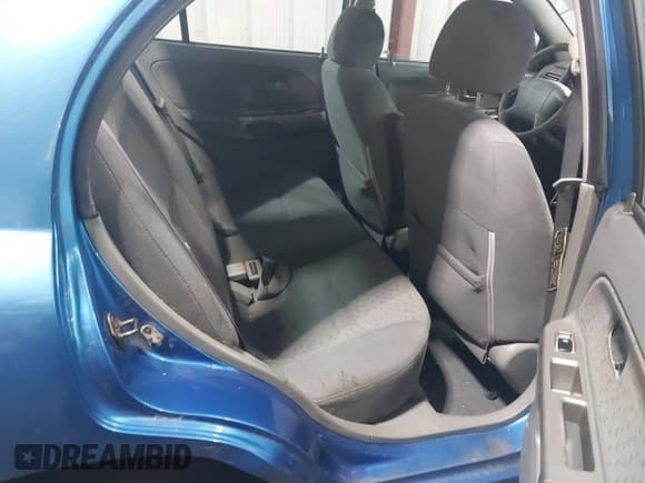 ✅ 2004 Kia Rio • VIN: KNADC125646305221 • Lot: 42970402. Wystawiony na IAAI z przebiegiem 163 556 mil. Bezpłatny archiwum sprzedaży aukcyjnych z USA i szczegółowy raport historii pojazdu na DreamBid. Zdjęcie 8.