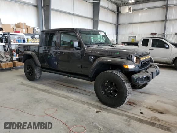✅ 2022 Jeep Gladiator Texas Trail • VIN: 1C6HJTAG7NL134613 • Лот: 70038155. Опубликован ранее на Copart с пробегом 52 438 миль. Бесплатный доступ к архиву аукционных продаж из США и подробный отчёт об истории автомобиля на DreamBid. Изображение 4.