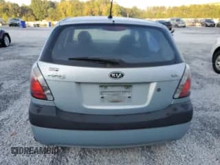 ✅ 2009 Kia Rio LX • VIN: KNADE243696496688 • Lot: 69143474. Listed on Copart with 146,717 mi. Free auction sales archive from the USA and detailed vehicle history report at DreamBid. Image 6.