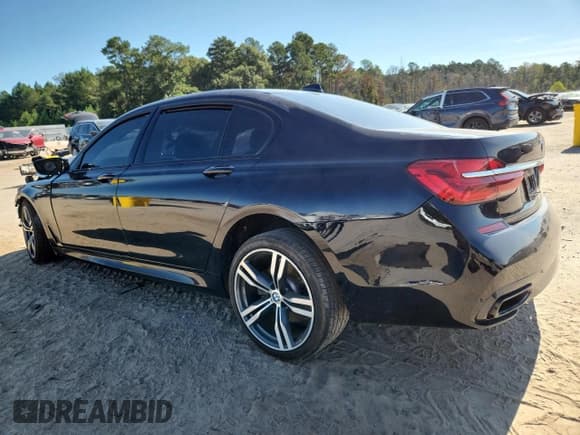 ✅ 2019 BMW 7 Series 750i • VIN: WBA7F0C50KGM24306 • Лот: 80523465. Опубликован ранее на Copart с пробегом Не указан. Бесплатный доступ к архиву аукционных продаж из США и подробный отчёт об истории автомобиля на DreamBid. Изображение 2.