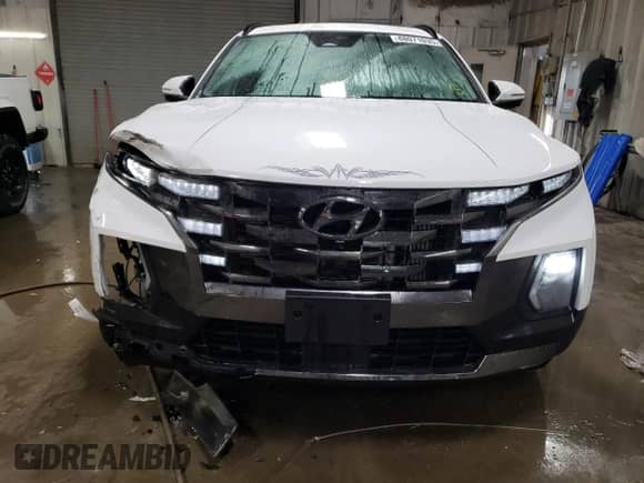 2022 Hyundai Santa Cruz Limited с VIN 5NTJEDAF3NH028869, выставлен на аукционе Copart как лот 88071035 с пробегом 18 304 миль миль и Списание • Salvage title. История ставок и продаж доступна на DreamBid. Изображение 5.