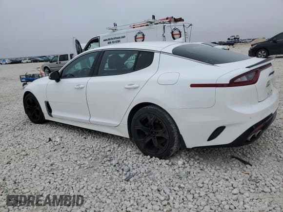 ✅ 2021 Kia Stinger GT-Line • VIN: KNAE15LA1M6094961 • Лот: 43943505. Опубликован ранее на Copart с пробегом 79 989 миль. Бесплатный доступ к архиву аукционных продаж из США и подробный отчёт об истории автомобиля на DreamBid. Изображение 2.