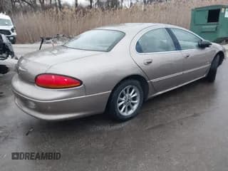 ✅ 2000 Chrysler LHS • VIN: 2C3HC56G9YH180828 • Lot: 41504718. Listed on IAAI with 153,670 mi. Free auction sales archive from the USA and detailed vehicle history report at DreamBid. Image 4.