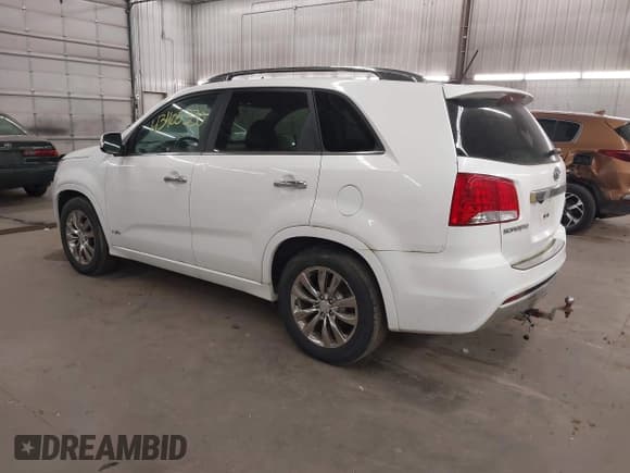 ✅ 2012 Kia Sorento SX • VIN: 5XYKWDA28CG219060 • Lot: 43405330. Listed on IAAI with 208,143 mi. Free auction sales archive from the USA and detailed vehicle history report at DreamBid. Image 3.