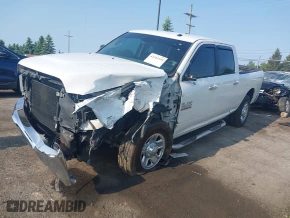 ✅ 2016 Ram 2500 Big Horn • VIN: 3C6UR5DL3GG308608 • Lot: 42393359. Listed on IAAI with 180,610 mi. Free auction sales archive from the USA and detailed vehicle history report at DreamBid. Image 2.