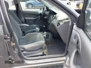 ✅ 2003 Ford Focus SE Fleet • VIN: 1FAFP36313W334084 • Lot: 42623903. Listed on IAAI with 113,182 mi. Free auction sales archive from the USA and detailed vehicle history report at DreamBid. Image 5.