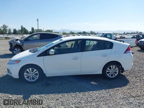 ✅ 2014 Honda Insight EX • VIN: JHMZE2H71ES002369 • Лот: 42455582. Опубликован ранее на IAAI с пробегом 114 331 миль. Бесплатный доступ к архиву аукционных продаж из США и подробный отчёт об истории автомобиля на DreamBid. Изображение 14.