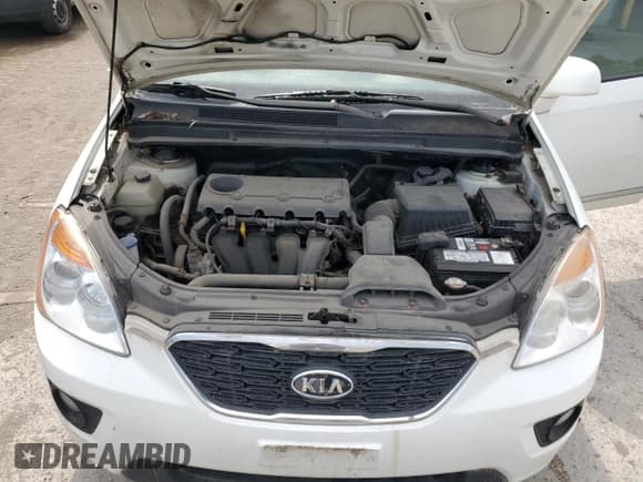 ✅ 2012 Kia Rondo • VIN: KNAHH8A85C7410672 • Лот: 65574495. Опубликован ранее на Copart с пробегом 236 454 миль. Бесплатный доступ к архиву аукционных продаж из США и подробный отчёт об истории автомобиля на DreamBid. Изображение 12.