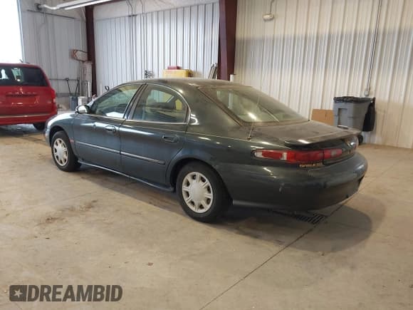 ✅ 1998 Mercury Sable GS • VIN: 1MEFM50U2WA614242 • Lot: 43900170. Listed on IAAI with 76,790 mi. Free auction sales archive from the USA and detailed vehicle history report at DreamBid. Image 3.