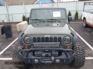 ✅ 2008 Jeep Wrangler Unlimited Rubicon • VIN: 1J8GA69168L591089 • Lot: 41487746. Listed on IAAI with 161,916 mi. Free auction sales archive from the USA and detailed vehicle history report at DreamBid. Image 13.