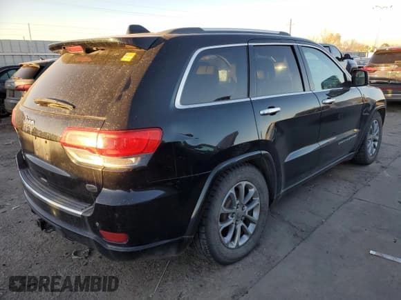 ✅ 2015 Jeep Grand Cherokee Overland • VIN: 1C4RJFCMXFC618455 • Lot: 80548554. Listed on Copart with 175,413 mi. Free auction sales archive from the USA and detailed vehicle history report at DreamBid. Image 3.