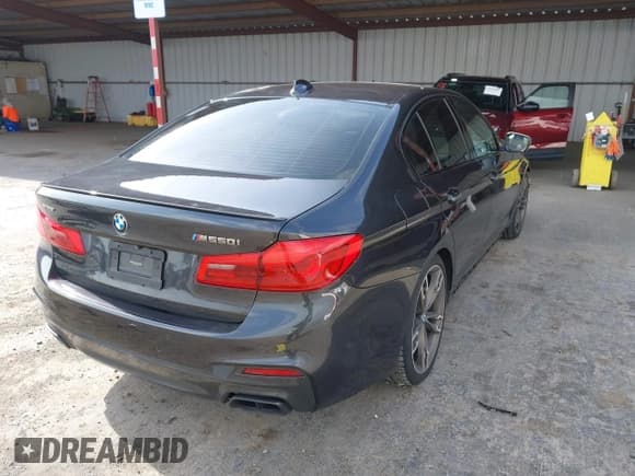 ✅ 2018 BMW 5 Series M550i xDrive • VIN: WBAJB9C5XJG464039 • Lot: 42114388. Listed on IAAI with 94,950 mi. Free auction sales archive from the USA and detailed vehicle history report at DreamBid. Image 4.