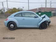 ✅ 2013 Volkswagen Beetle 2.5L • VIN: 3VWJP7AT4DM656381 • Lot: 43627786. Listed on IAAI with 141,093 mi. Free auction sales archive from the USA and detailed vehicle history report at DreamBid. Image 13.