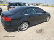 ✅ 2013 Volkswagen Jetta TDI w/Premium • VIN: 3VWLL7AJ2DM203752 • Lot: 52490645. Listed on Copart with 189,888 mi. Free auction sales archive from the USA and detailed vehicle history report at DreamBid. Image 3.