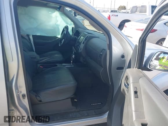 ✅ 2018 Nissan Frontier SV • VIN: 1N6AD0EV0JN761092 • Lot: 41502701. Listed on IAAI with 103,900 mi. Free auction sales archive from the USA and detailed vehicle history report at DreamBid. Image 5.