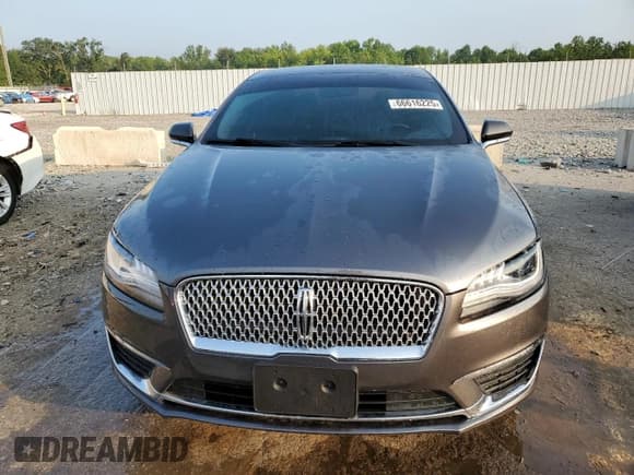 ✅ 2018 Lincoln MKZ Select • VIN: 3LN6L5D9XJR614011 • Лот: 66616225. Опубликован ранее на Copart с пробегом 131 544 миль. Бесплатный доступ к архиву аукционных продаж из США и подробный отчёт об истории автомобиля на DreamBid. Изображение 5.