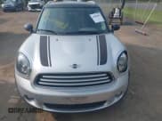 ✅ 2012 MINI Countryman • VIN: WMWZB3C5XCWM30143 • Lot: 42404893. Listed on IAAI with 143,836 mi. Free auction sales archive from the USA and detailed vehicle history report at DreamBid. Image 12.