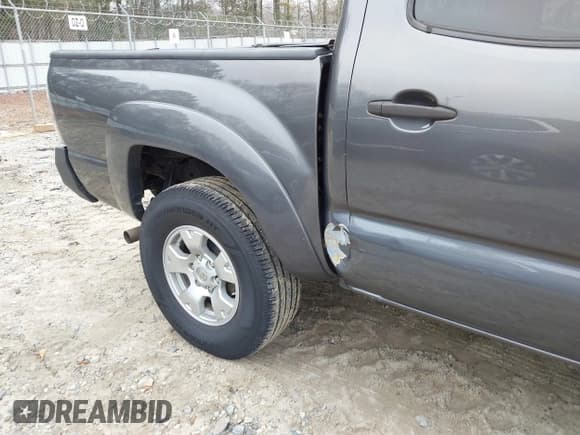 ✅ 2013 Toyota Tacoma PreRunner • VIN: 5TFJU4GN0DX041470 • Lot: 41207148. Wystawiony na IAAI z przebiegiem 165 562 mil. Bezpłatny archiwum sprzedaży aukcyjnych z USA i szczegółowy raport historii pojazdu na DreamBid. Zdjęcie 17.