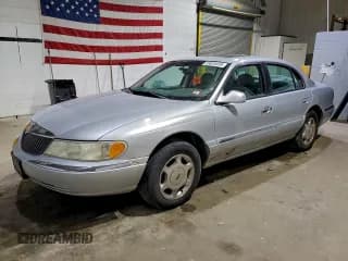 ✅ 2001 Lincoln Continental • VIN: 1LNHM97V91Y680573 • Лот: 93828455. Опубликован ранее на Copart с пробегом 94 550 миль. Бесплатный доступ к архиву аукционных продаж из США и подробный отчёт об истории автомобиля на DreamBid. Изображение 1.