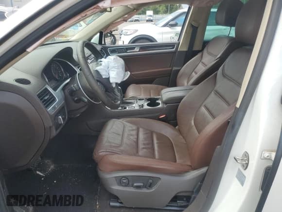 ✅ 2013 Volkswagen Touareg Lux • VIN: WVGEF9BP4DD013167 • Lot: 60422255. Listed on Copart with 157,319 mi. Free auction sales archive from the USA and detailed vehicle history report at DreamBid. Image 7.