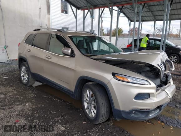 ✅ 2014 Jeep Cherokee Limited • VIN: 1C4PJMDSXEW300700 • Лот: 43648307. Опубликован ранее на IAAI с пробегом 125 257 миль. Бесплатный доступ к архиву аукционных продаж из США и подробный отчёт об истории автомобиля на DreamBid. Изображение 1.