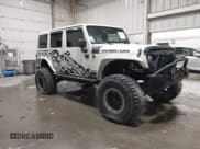 ✅ 2017 Jeep Wrangler Unlimited Rubicon Recon • VIN: 1C4BJWFG5HL512375 • Lot: 43458253. Wystawiony na IAAI z przebiegiem 94 648 mil. Bezpłatny archiwum sprzedaży aukcyjnych z USA i szczegółowy raport historii pojazdu na DreamBid. Zdjęcie 1.