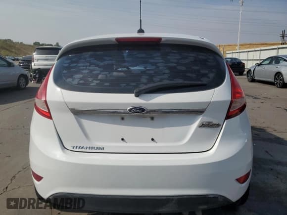 ✅ 2013 Ford Fiesta Titanium • VIN: 3FADP4FJ6DM150112 • Lot: 68310475. Wystawiony na Copart z przebiegiem 122 926 mil. Bezpłatny archiwum sprzedaży aukcyjnych z USA i szczegółowy raport historii pojazdu na DreamBid. Zdjęcie 6.