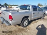 ✅ 2002 Dodge Dakota Sport • VIN: 1B7HL38N02S681523 • Lot: 43537584. Wystawiony na IAAI z przebiegiem 216 042 mil. Bezpłatny archiwum sprzedaży aukcyjnych z USA i szczegółowy raport historii pojazdu na DreamBid. Zdjęcie 4.