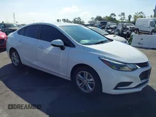 ✅ 2018 Chevrolet Cruze LT • VIN: 1G1BE5SM5J7181430 • Lot: 43348840. Listed on IAAI with 94,100 mi. Free auction sales archive from the USA and detailed vehicle history report at DreamBid. Image 1.