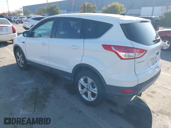✅ 2013 Ford Escape SE • VIN: 1FMCU9GX9DUC87292 • Lot: 43837293. Listed on IAAI with 140,103 mi. Free auction sales archive from the USA and detailed vehicle history report at DreamBid. Image 3.