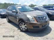 ✅ 2015 Cadillac SRX • VIN: 3GYFNAE35FS542016 • Лот: 42669025. Опубликован ранее на IAAI с пробегом 197 830 миль. Бесплатный доступ к архиву аукционных продаж из США и подробный отчёт об истории автомобиля на DreamBid. Изображение 1.