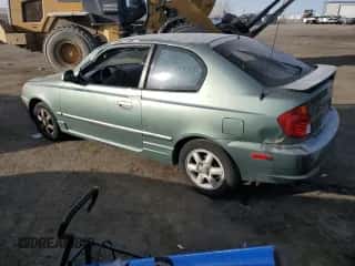 2003 Hyundai Accent GL with VIN KMHCG35CX3U242848, listed as a Copart auction lot 86558394 with 56,248 mi miles and Salvage title. Bid and sale history available at DreamBid. Image 2.