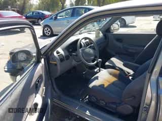 2005 Hyundai Accent GLS z VIN KMHCG35C25U348410, wystawiony jako IAAI lot #41729780 z przebiegiem 166 216 mil mil oraz . Historia ofert i sprzedaży dostępna na DreamBid. Obrazek 5.