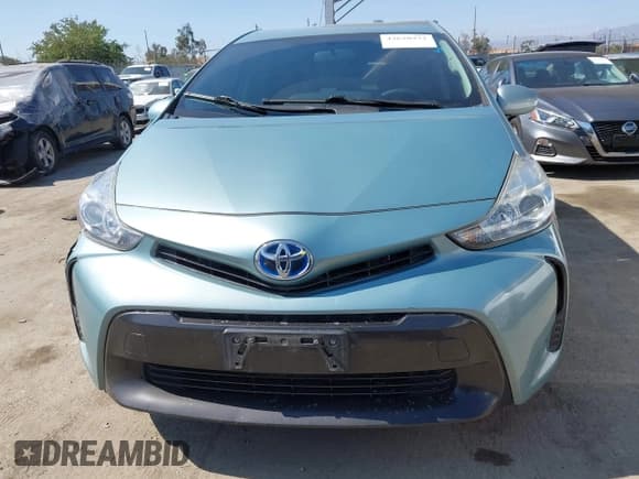 ✅ 2015 Toyota Prius Two • VIN: JTDZN3EU9FJ032759 • Lot: 42620922. Listed on IAAI with 151,572 mi. Free auction sales archive from the USA and detailed vehicle history report at DreamBid. Image 12.