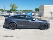 ✅ 2021 Tesla Model S Plaid • VIN: 5YJSA1E61MF435321 • Lot: 41832006. Listed on IAAI with 23,361 mi. Free auction sales archive from the USA and detailed vehicle history report at DreamBid. Image 13.