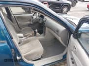 ✅ 1999 Toyota Corolla VE • VIN: 1NXBR12E7XZ192769 • Lot: 41825479. Listed on IAAI with 143,378 mi. Free auction sales archive from the USA and detailed vehicle history report at DreamBid. Image 5.