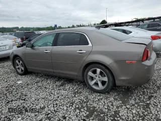 ✅ 2012 Chevrolet Malibu 1LT • VIN: 1G1ZC5E06CF323953 • Lot: 57441024. Listed on Copart with 153,627 mi. Free auction sales archive from the USA and detailed vehicle history report at DreamBid. Image 2.