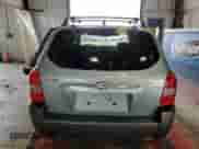 2006 Hyundai Tucson GLS with VIN KM8JN72D26U346076, listed as a Copart auction lot 77447474 with 123,993 mi miles and Salvage title. Bid and sale history available at DreamBid. Image 6.