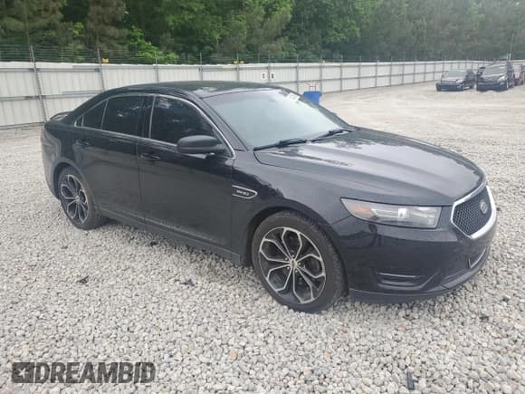 ✅ 2016 Ford Taurus SHO • VIN: 1FAHP2KTXGG155969 • Lot: 54431405. Listed on Copart with 124,040 mi. Free auction sales archive from the USA and detailed vehicle history report at DreamBid. Image 4.