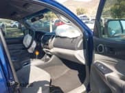 ✅ 2014 Toyota Tacoma PreRunner • VIN: 5TFTU4GNXEX056178 • Lot: 43344457. Listed on IAAI with 185,884 mi. Free auction sales archive from the USA and detailed vehicle history report at DreamBid. Image 5.