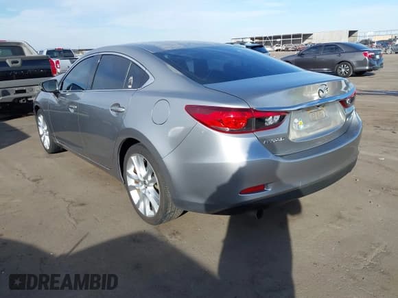 ✅ 2015 Mazda 6 i Touring • VIN: JM1GJ1V56F1210501 • Lot: 41539315. Listed on IAAI with 98,669 mi. Free auction sales archive from the USA and detailed vehicle history report at DreamBid. Image 3.